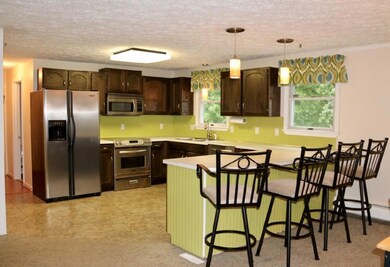 The kitchen has a breakfast bar.