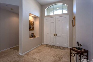 The spacious entry  foyer, and the entry into the 