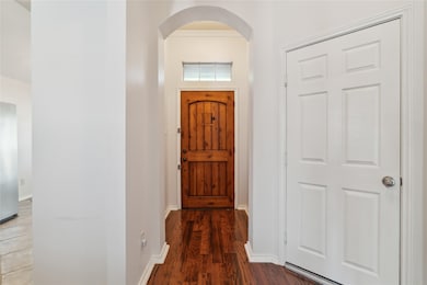 Upon entry, you're welcomed by a charming foyer fe