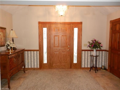 Nice sized Foyer with double side light entry door