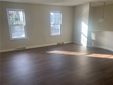 THIS VIEW OF THE LIVING ROOM SHOWS THE UNIQUENESS