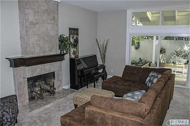 The detailed stone work in the fireplace is very s