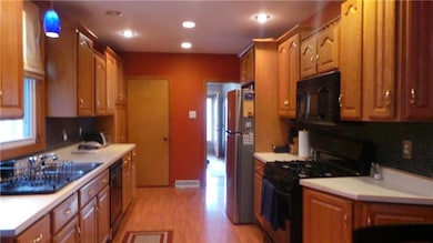 Appliances stay.  Door leads to lower level