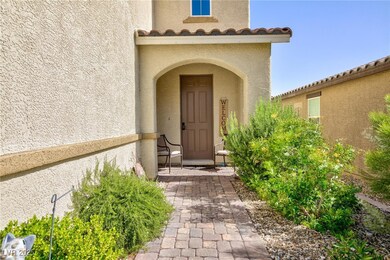 Entrance to property with stucco siding