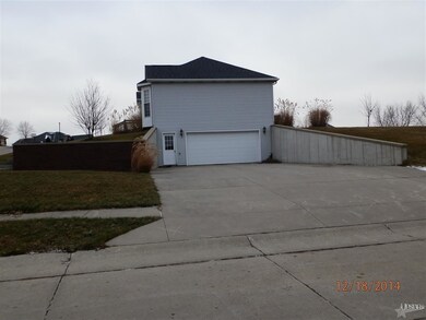 Oversized garage, family room and laundry on lower