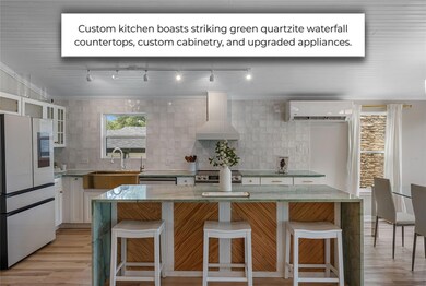 Kitchen featuring freestanding refrigerator, ligh
