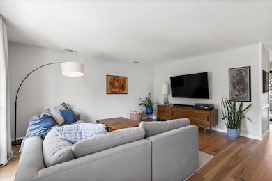 Living room featuring light wood finished floors 