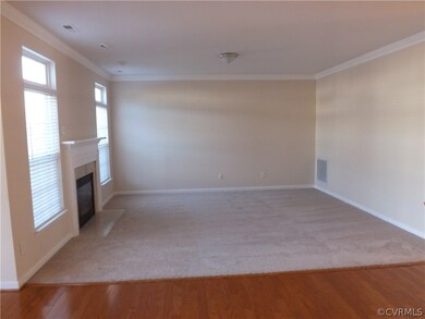 Family Room with Gas Fireplace and Crown Molding