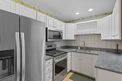 To the back left you'll head into the kitchen area