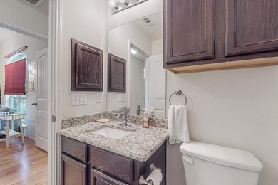 Bathroom featuring hardwood / wood-style flooring,