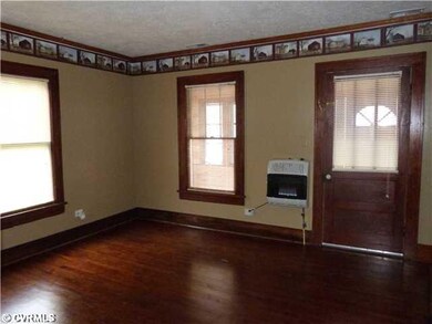 Living Room - Look at those beautiful floors and gas heater available