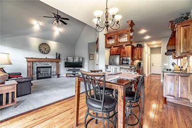 Hearthroom with eat-in kitchen to enjoy the family while cooking (unless they are in the pool!).