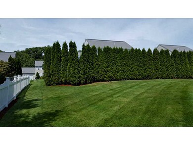 Exterior Back. Grass Area behind the pool area