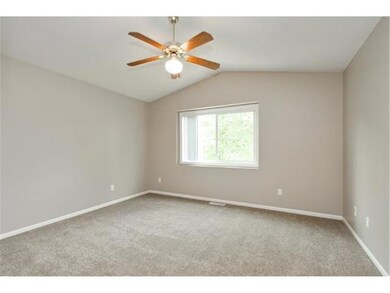 Vaulted master suite with walk-in closet and bathr