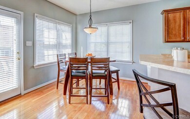 View of brightly lit eat-in kitchen area featuring