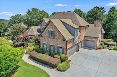 View of front of property with brick siding, drive