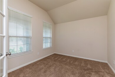 Study or flex room with double french doors, with great view on front yard.