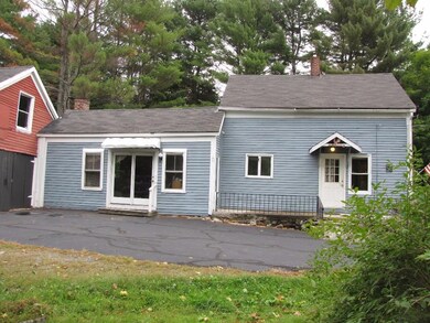 West side of home with entry doors...