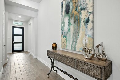 Welcoming entryway with abundant natural light.