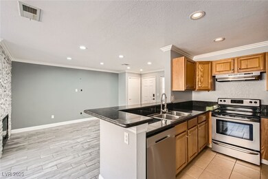 Kitchen with appliances with stainless steel finis