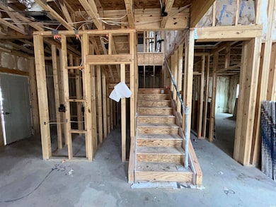 Basement featuring stairs