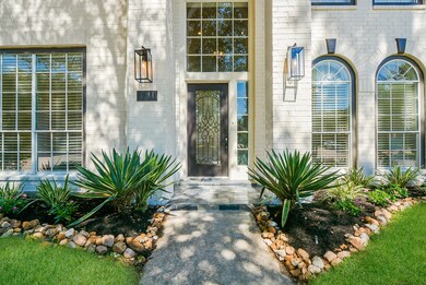 New front entry door, new slate porch, and new modern coach lights!