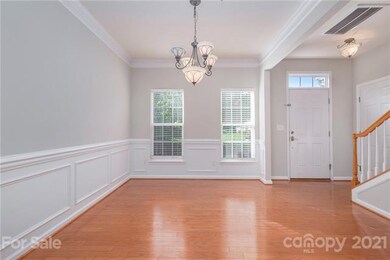 Flex space at the entry for formal dining, sitting
