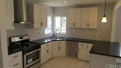 Stainless gas stove & range! Tile Floors!