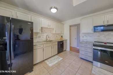 8837 Flintlock Rd, Knoxville, TN 37931 - photo 7