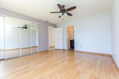 The spacious and private master bedroom comes with