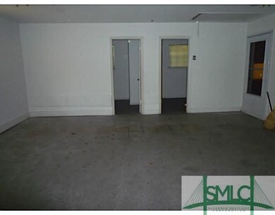 Parking Lot/Garage. SIDE ENTRY TO KITCHEN FROM INS