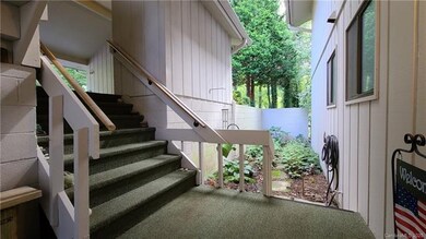 Your front door opens to your parking, and to a sm