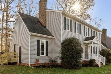 View of side entry and pedestrian door that leads to attached storage room.