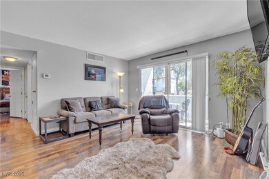 Living area featuring Laminate wood finished floor