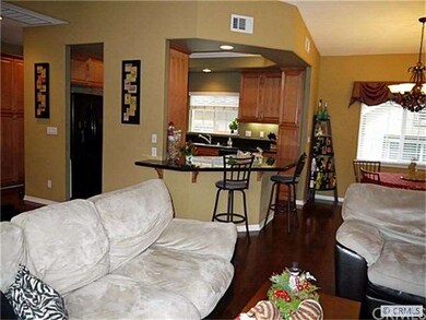 Living Room looking to Kitchen and Dining area, va