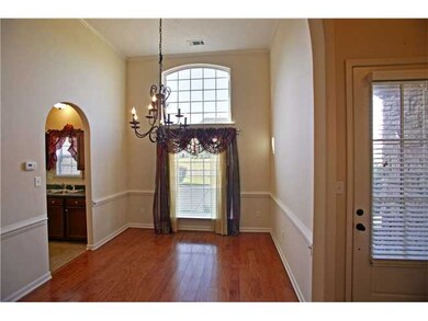 Hardwoods and 12 foot ceilings in this wonderful d