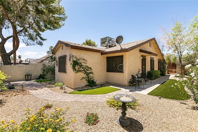 View of side of property featuring a patio area, s
