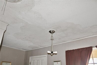water damage inside front entry ceiling
