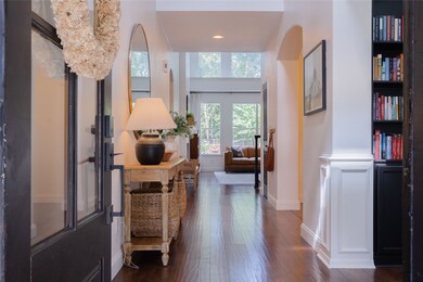 Two story entry way, flooded with natural light.