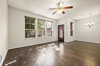 Spare room with baseboards, ceiling fan with nota