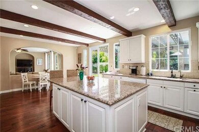 Impressive kitchen has ample prep space and breakf