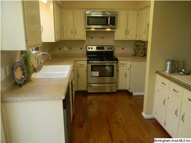 Updated kitchen with lots of cabinets and new stai