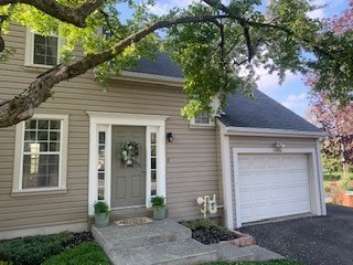 Welcoming entry, one car attached garage, and park