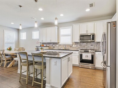 All builder grade appliances in the kitchen replac