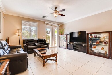 Family room with crown molding and 2 tone paint th