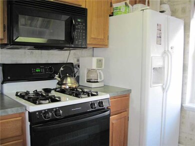 Kitchen. Newer cabinets, appliances, countertops, 