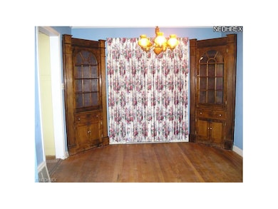 Formal Dining Room Exits to Sun Room and    Back Yard