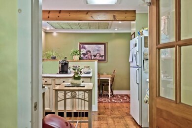 Notice the knotty pine floors in the...