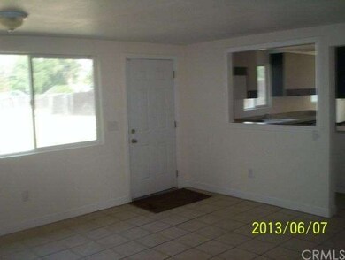LIVING ROOM TOWARDS FRONT DOOR