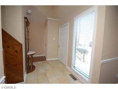 Foyer - 2-story foyer with tile floors.